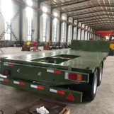 Vilka är de vanliga bredderna på låga plattbäddssemitrailers?