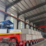 Vilken funktion har den hydrauliska ackumulatorn i en hydraulisk axelvagn?